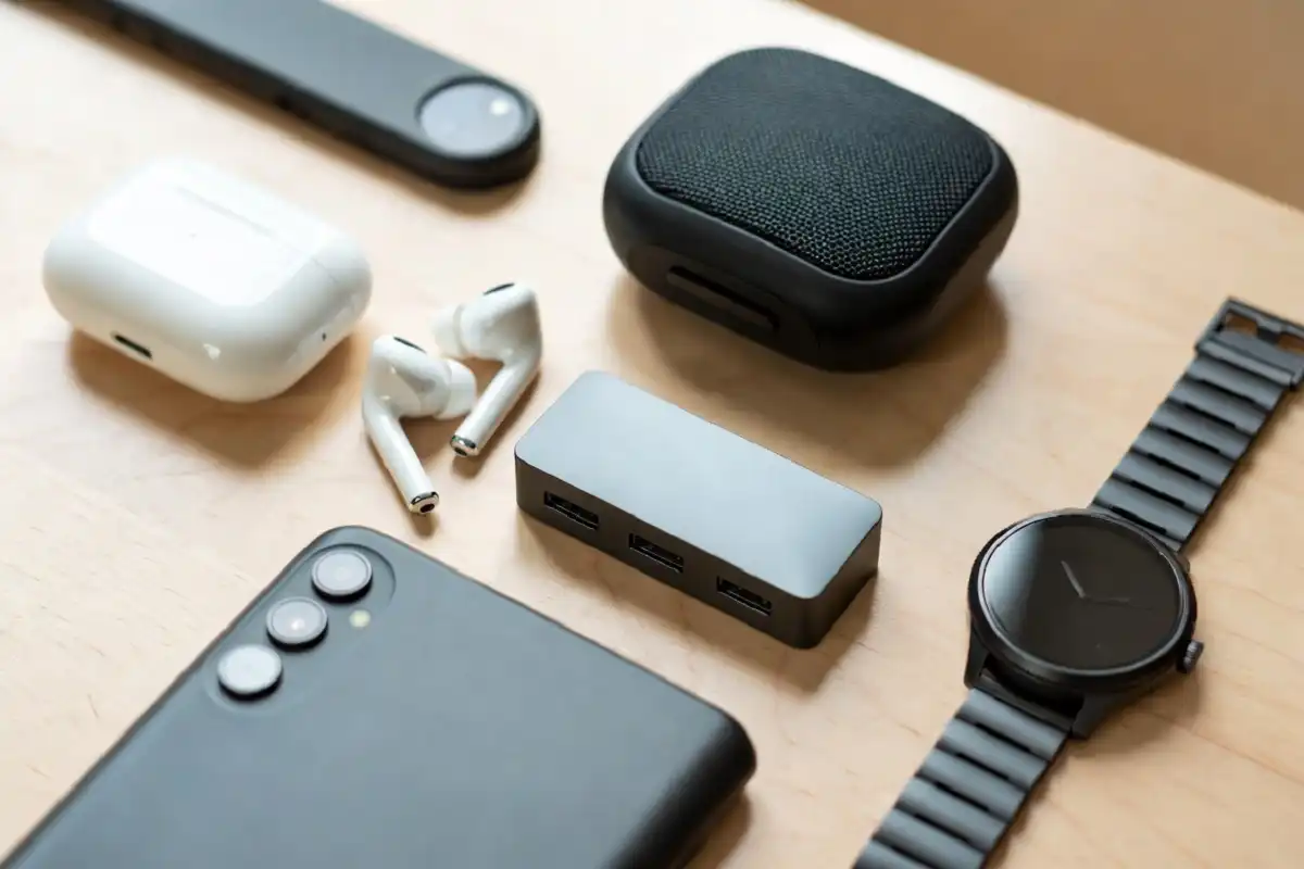 Collection of small budget tech gadgets on a wooden table