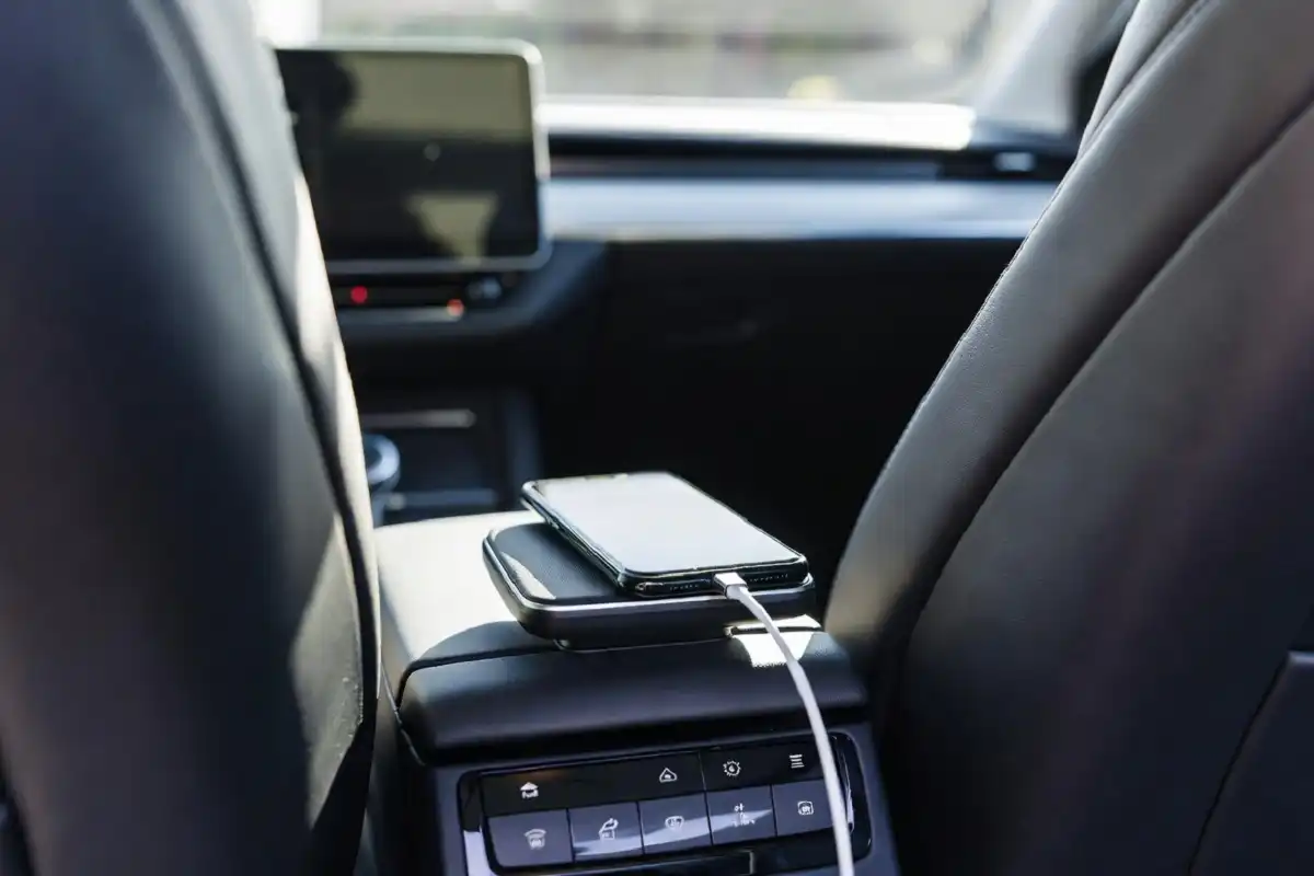 wireless phone charger and comfort gadgets inside a modern car