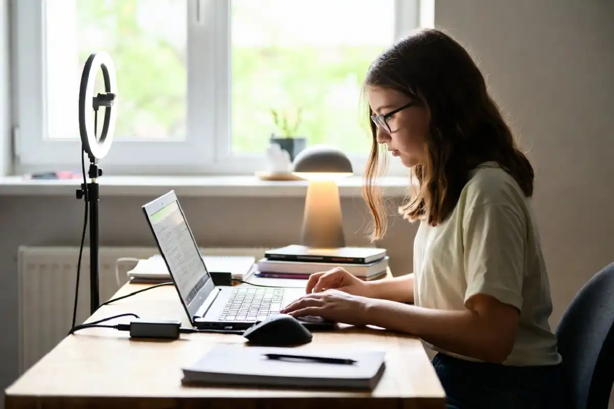 Student using affordable gadgets under 500 for study setup