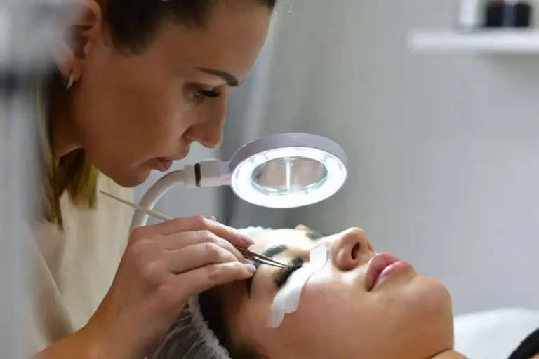 Professional lash tech near me applying eyelash extensions in a clean salon setting