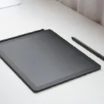 reMarkable 2 review tablet and marker pen laid flat on a white desk in a clean product shot