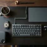 best tech gadgets for men 2026 flat lay desk setup