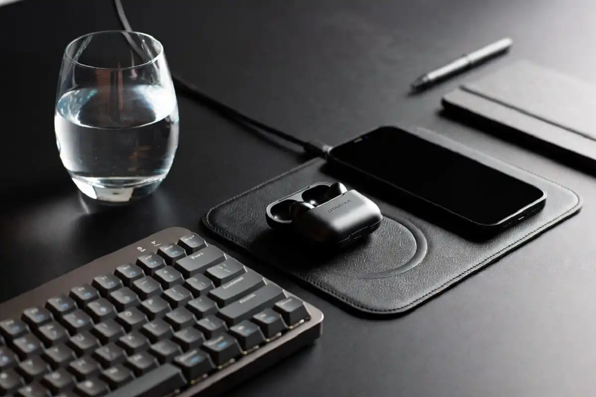 Premium wireless charging desk mat on a modern man's workspace