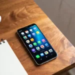 Smartphone showing Android productivity tools apps on a tidy desk
